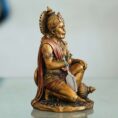 Polished copper Hanuman statue in a devotional pose—symbol of strength, protection, and good fortune for home or office décor.