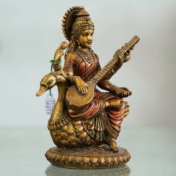 Saraswati Maa idol seated on a swan playing veena—symbol of knowledge, music, and wisdom, perfect for home décor and gifting.