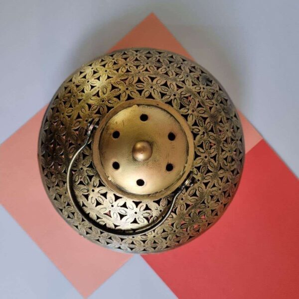 Elegant brass incense burner with a top opening for sticks and wide base for ashes—perfect for meditation, pooja, and home décor.