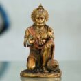 Polished copper Hanuman statue in a devotional pose—symbol of strength, protection, and good fortune for home or office décor.
