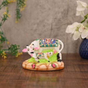 Hand-carved white marble Kamdhenu Cow and Calf statue—symbol of prosperity, blessings, and divine energy for home or office décor.