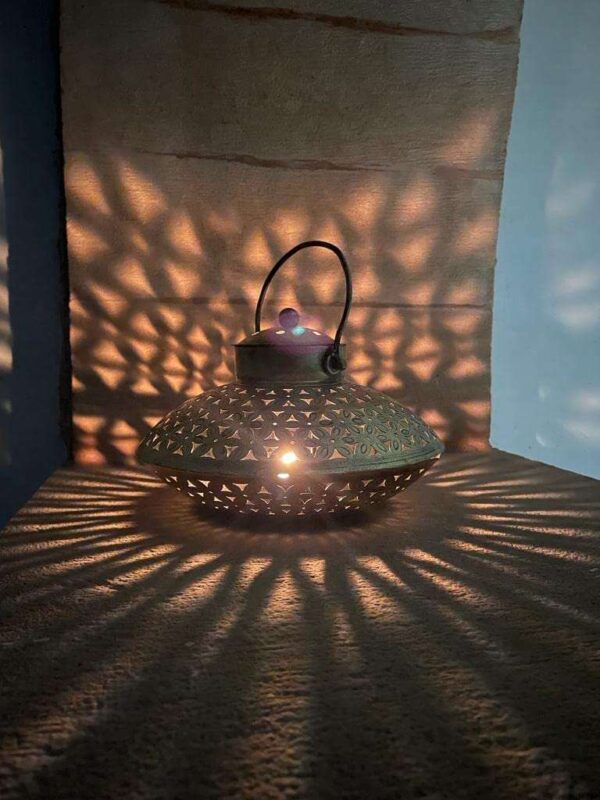 Elegant brass incense burner with a top opening for sticks and wide base for ashes—perfect for meditation, pooja, and home décor.