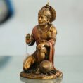 Polished copper Hanuman statue in a devotional pose—symbol of strength, protection, and good fortune for home or office décor.